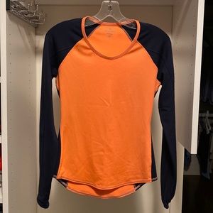 Athleta XS workout shirt. Orange with navy long sleeves.